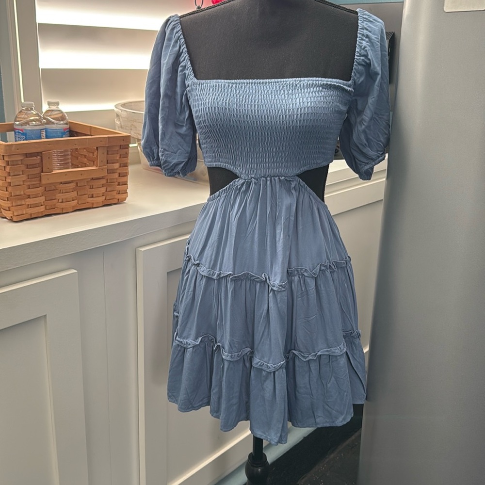 NWT Camellia Boho dress.  Elastic bodice with cutouts 
Size is Women’s small.